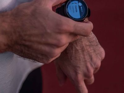 Detail of a sports watch showing active heart rate.